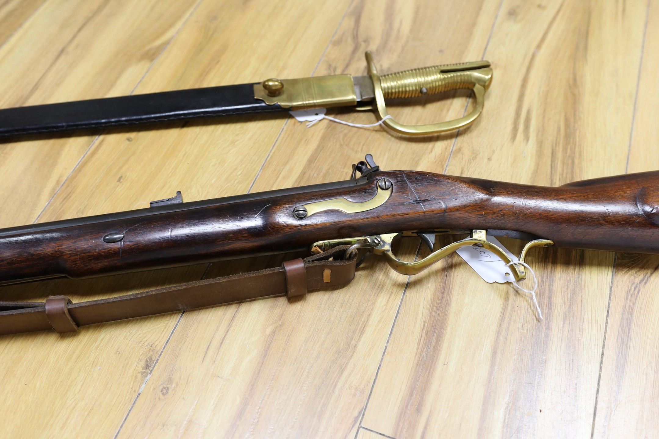 A Brown Bess East India Company musket, refubished, with later bayonet